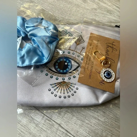 NWOT Evil eye cosmetic pouch with evil eye keychain and blue ponytail. - Picture 5 of 5